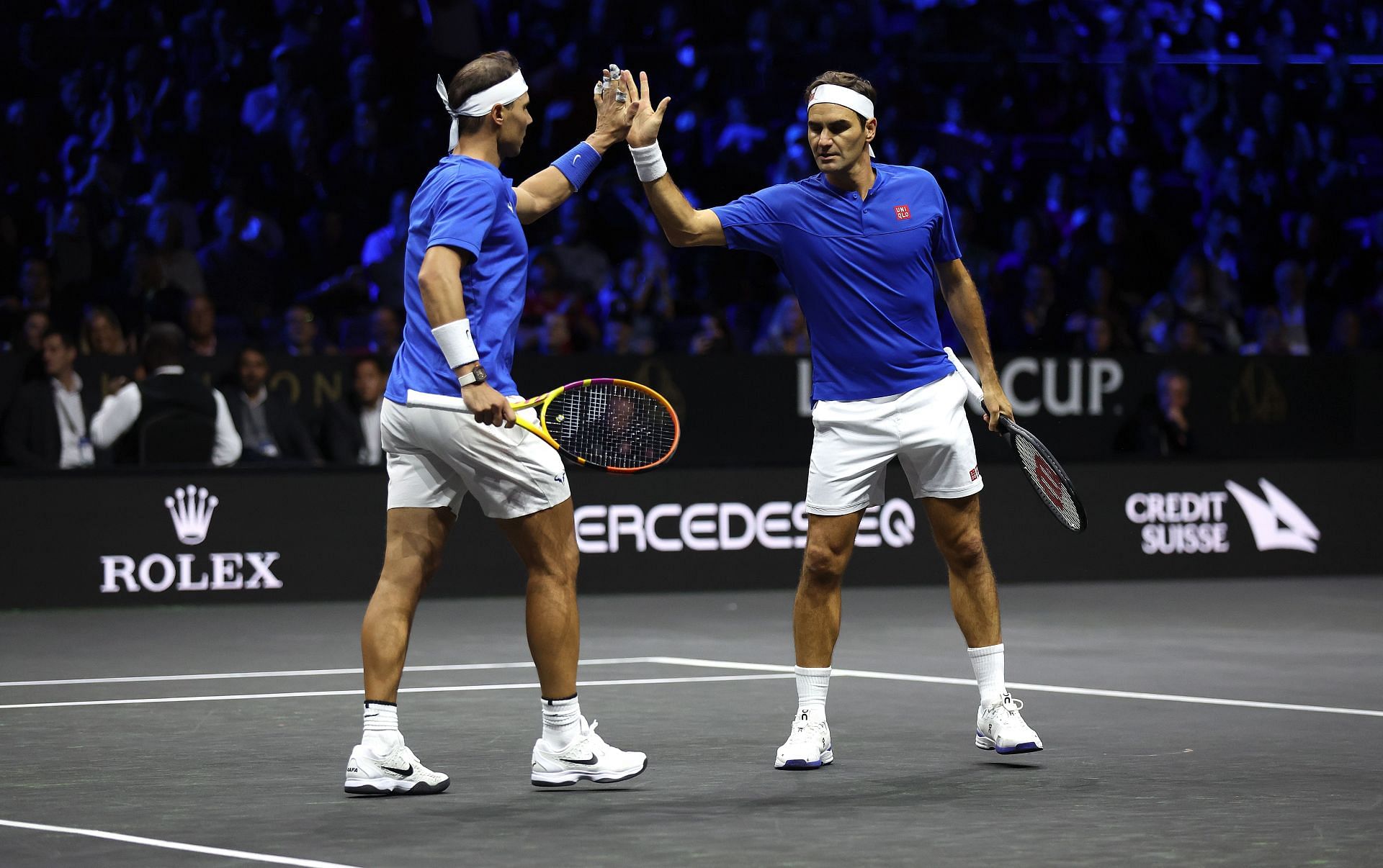 Rafael Nadal (L) and Roger Federer of Team Europe during the doubles match between Jack Sock and Frances Tiafoe at the Laver Cup 2022 - Day One