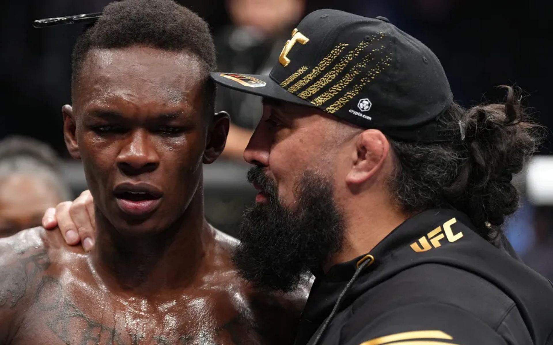 Israel Adesanya (left) and Eugene Bareman (right). [Image courtesy: Getty Images]