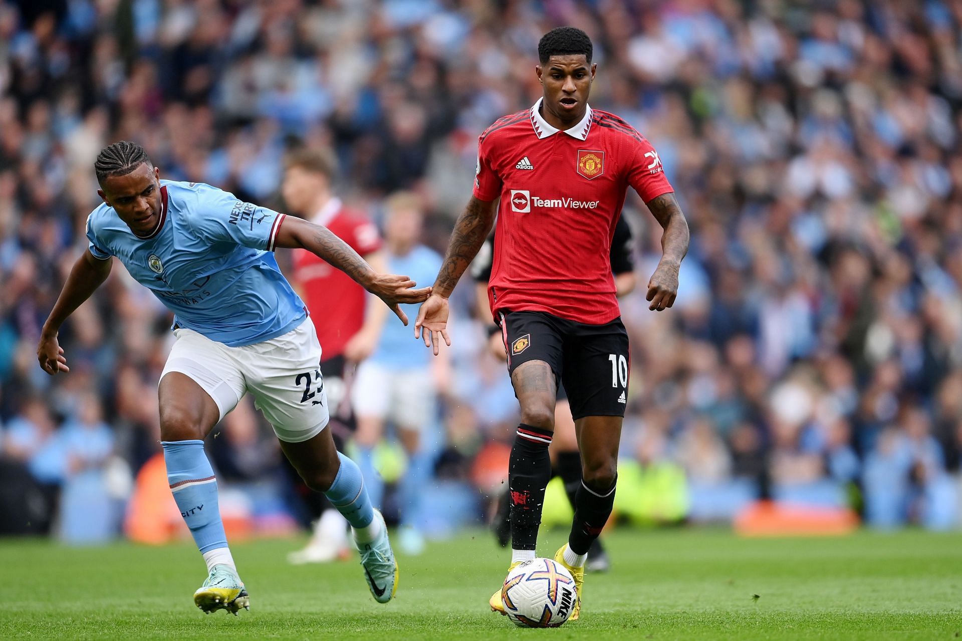 Marcus Rashford (right) has admirers at the Emirates.