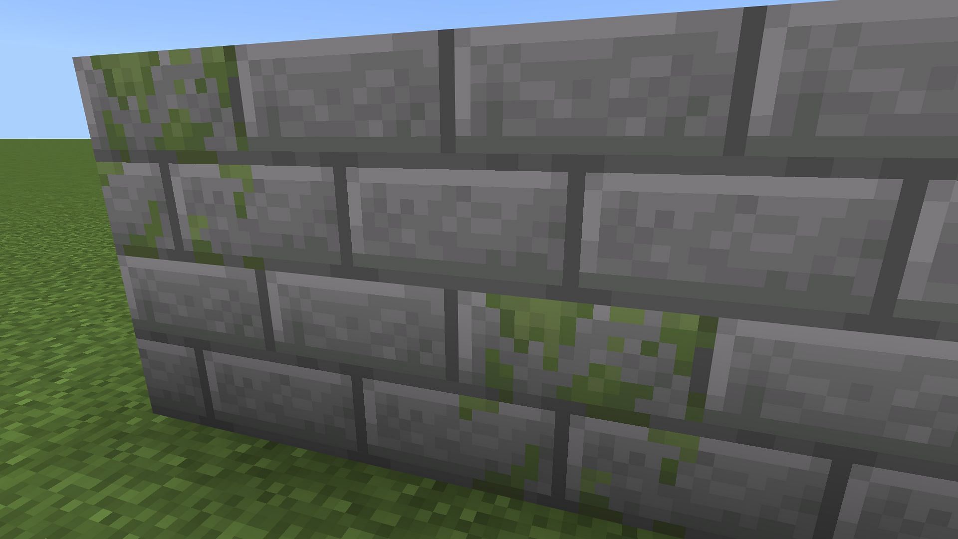 Mossy stone bricks can be added with regular stone bricks for aging a Minecraft structure (Image via Mojang)