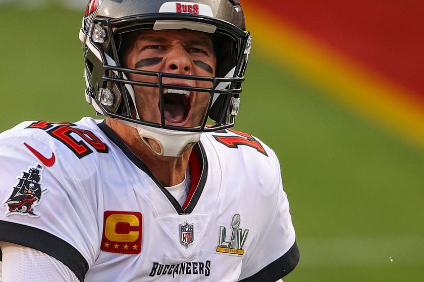 Tampa Bay Buccaneers football helmets sit on the sidelines before