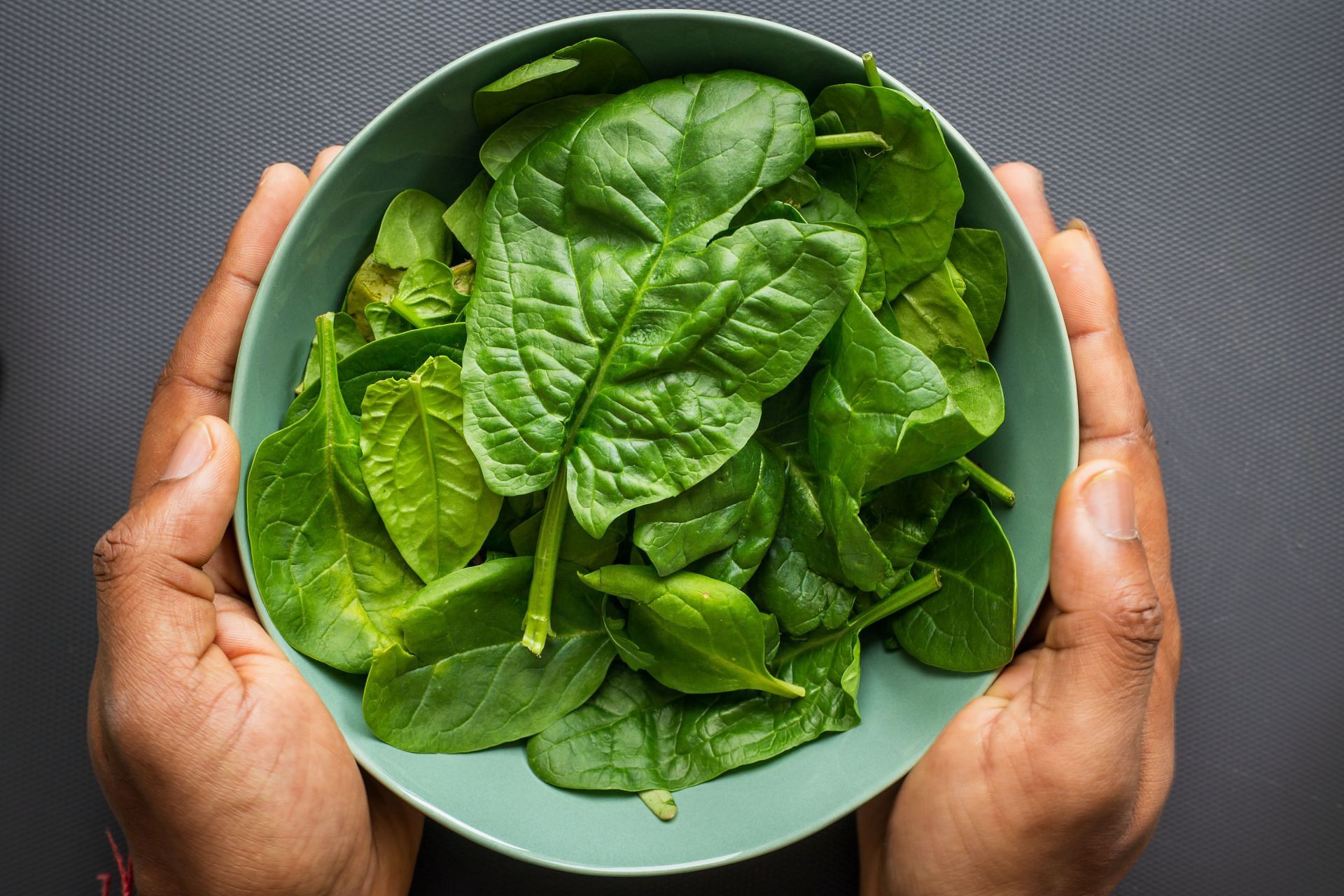 Spinach is a superfood. (Image via Unsplash/Louis Hansel)
