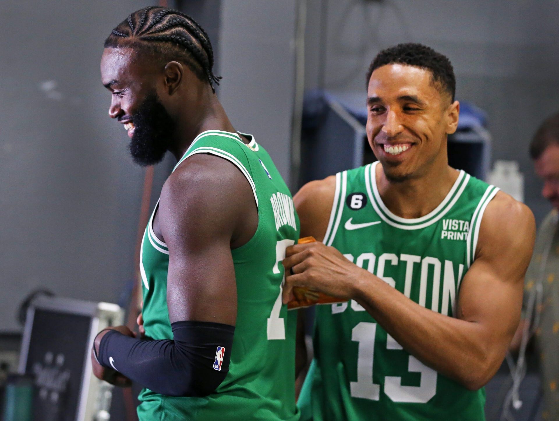 Celtics teammates Jaylen Brown, left, and Malcolm Brogdon