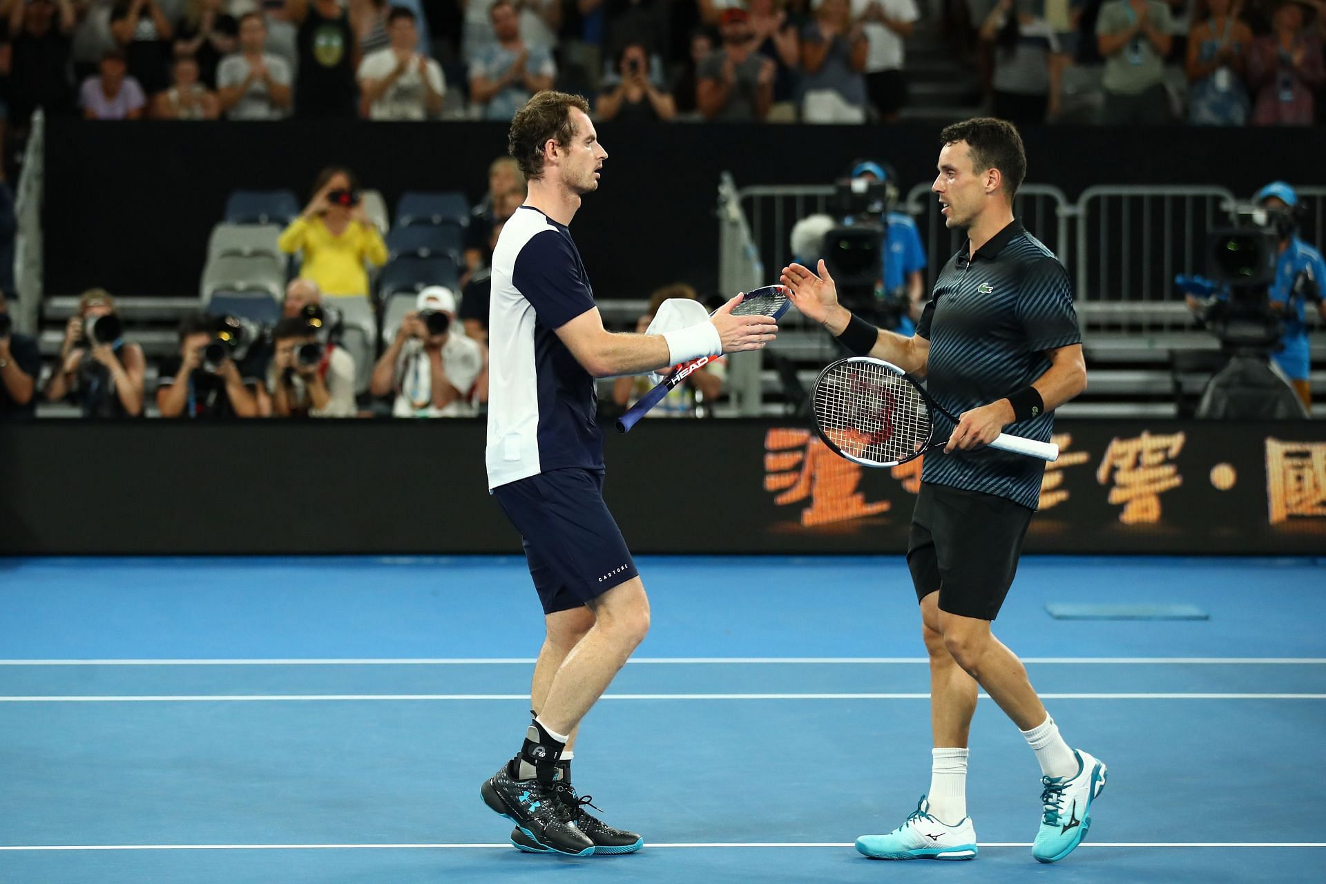 Andy Murray and Roberto Bautista Agut at the 2019 Australian Open.
