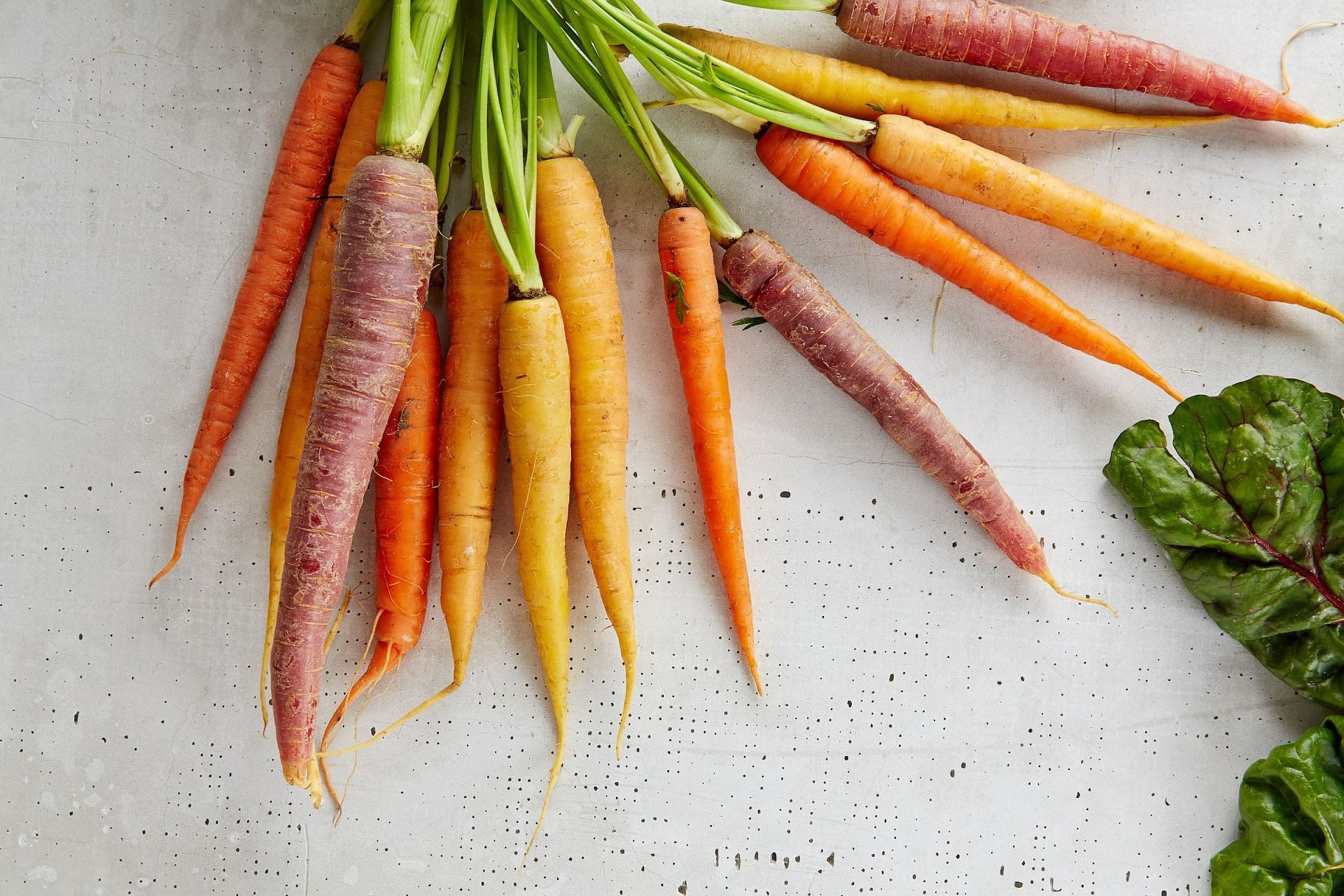 Carrots are high in beta carotene. (Image via Unsplash/Gabriel Gurrola)