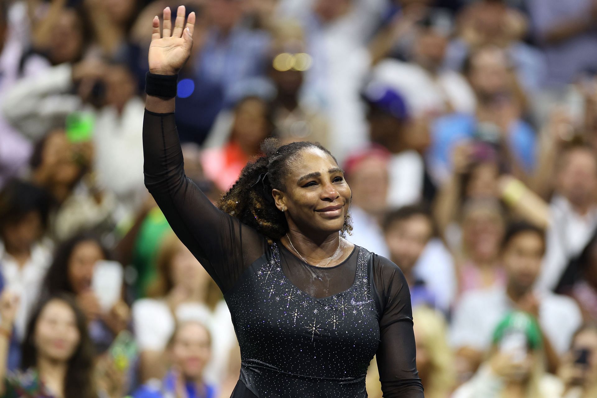 Serena Williams waves to the crowd at the 2022 US Open.