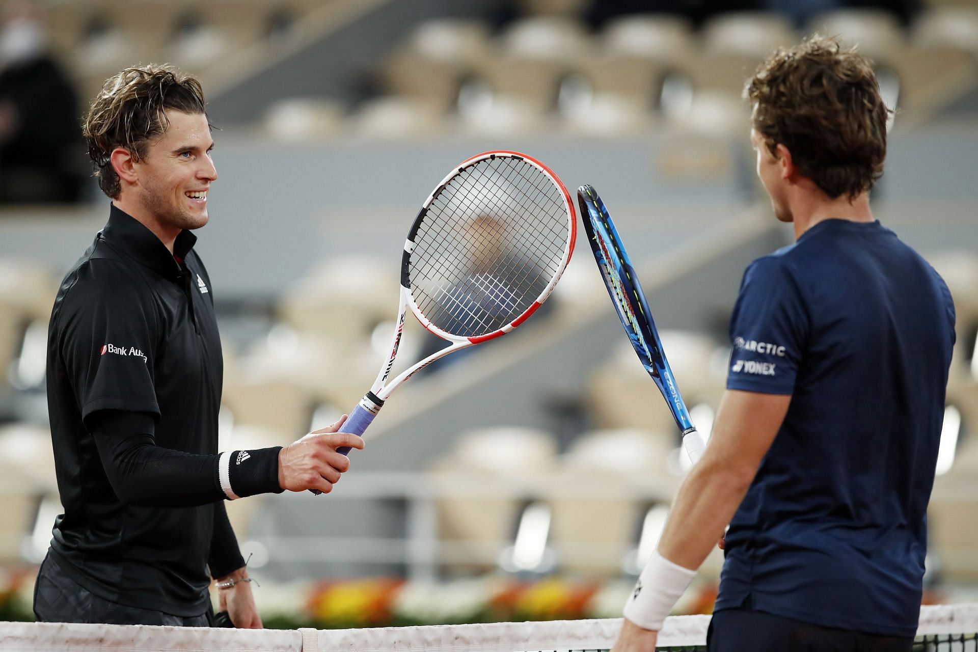 Dominic Thiem (left) and Casper Ruud (right) after their third-round match at the 2020 French Open