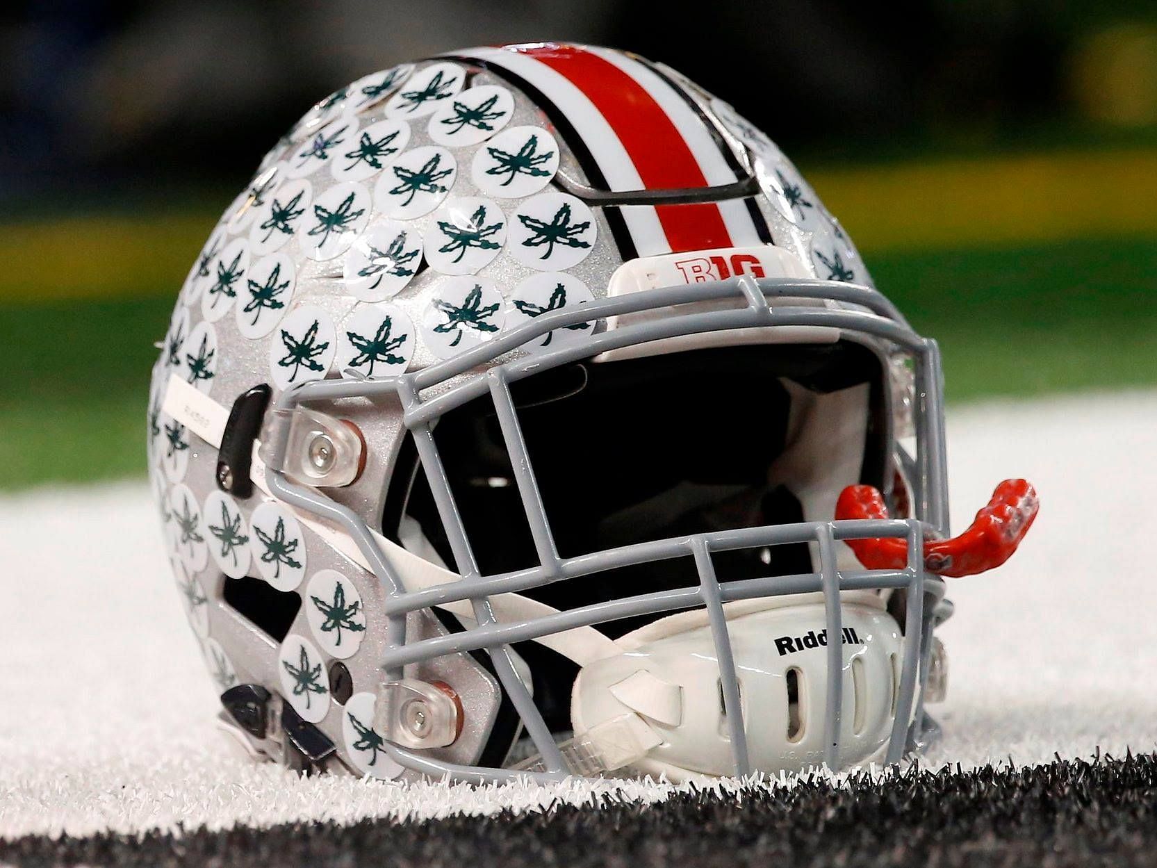 What are the stickers on football helmets?