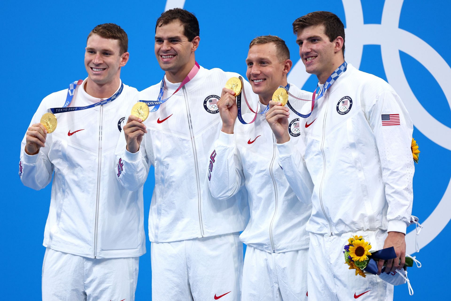 Ryan Murphy, Michael Andrew, Caeleb Dressel and Zach Apple of Team United States pose on the podium during the medal ceremony for the Men&#039;s 4 x 100m Medley Relay Final (Image via Maddie Meyer/Getty Images)