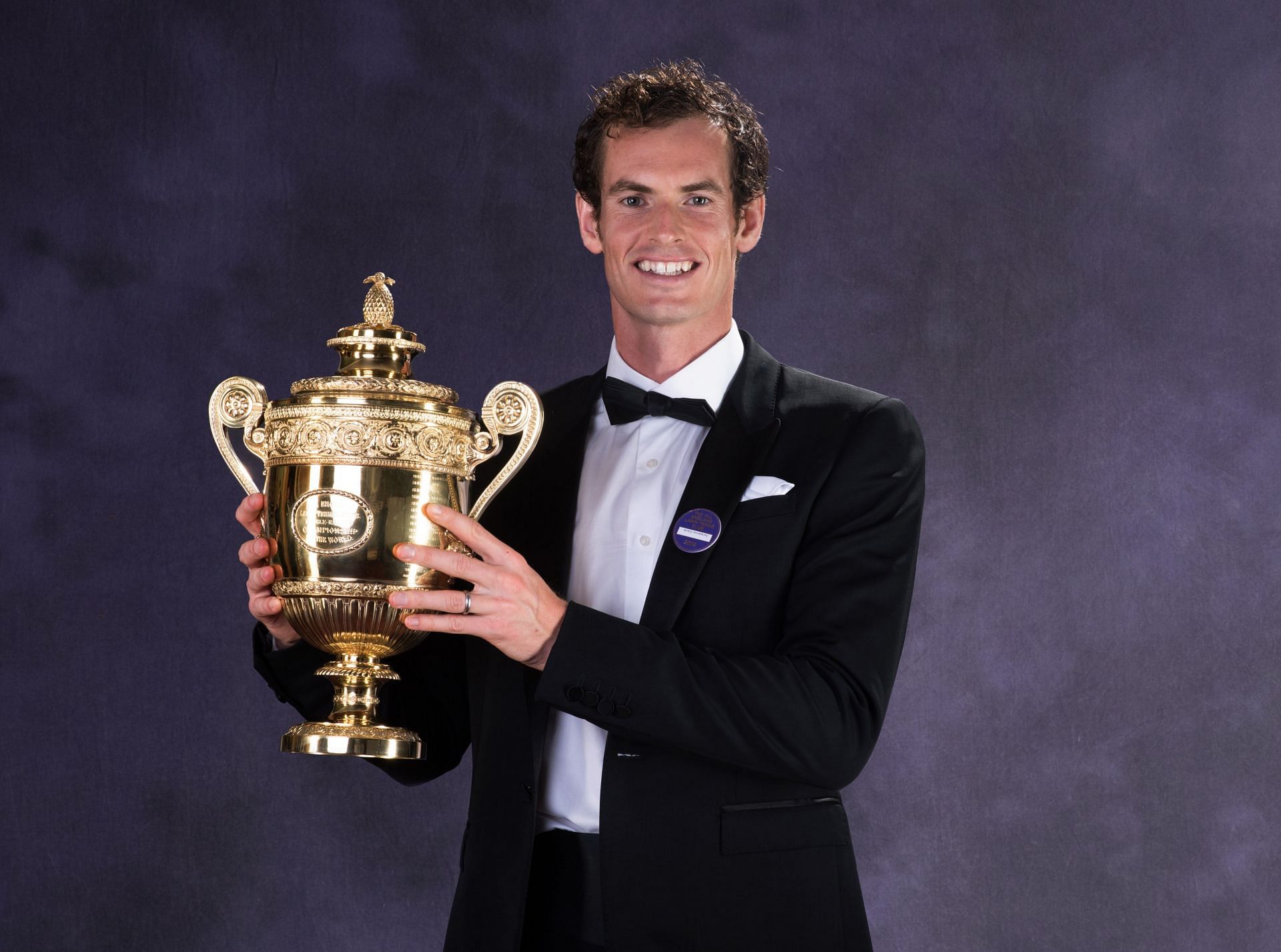 Murray with the trophy at Wimbledon 2016