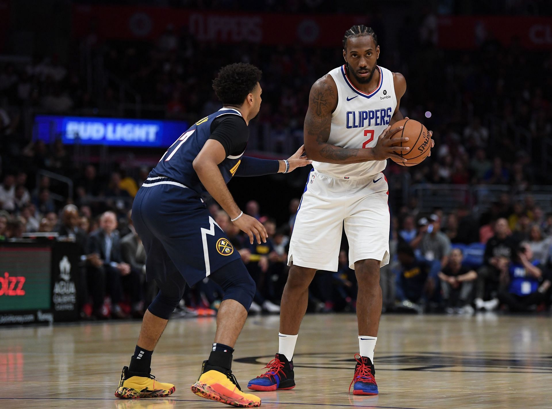 Jamal Murray of the Denver Nuggets (left) and Kawhi Leonard of the LA Clippers