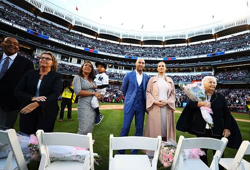 Derek Jeter looks on with his Wife Hannah Davis and the rest of his family during the retirement ceremony of his number 2 jersey at Yankee Stadium on May 14, 2017 in New York City.