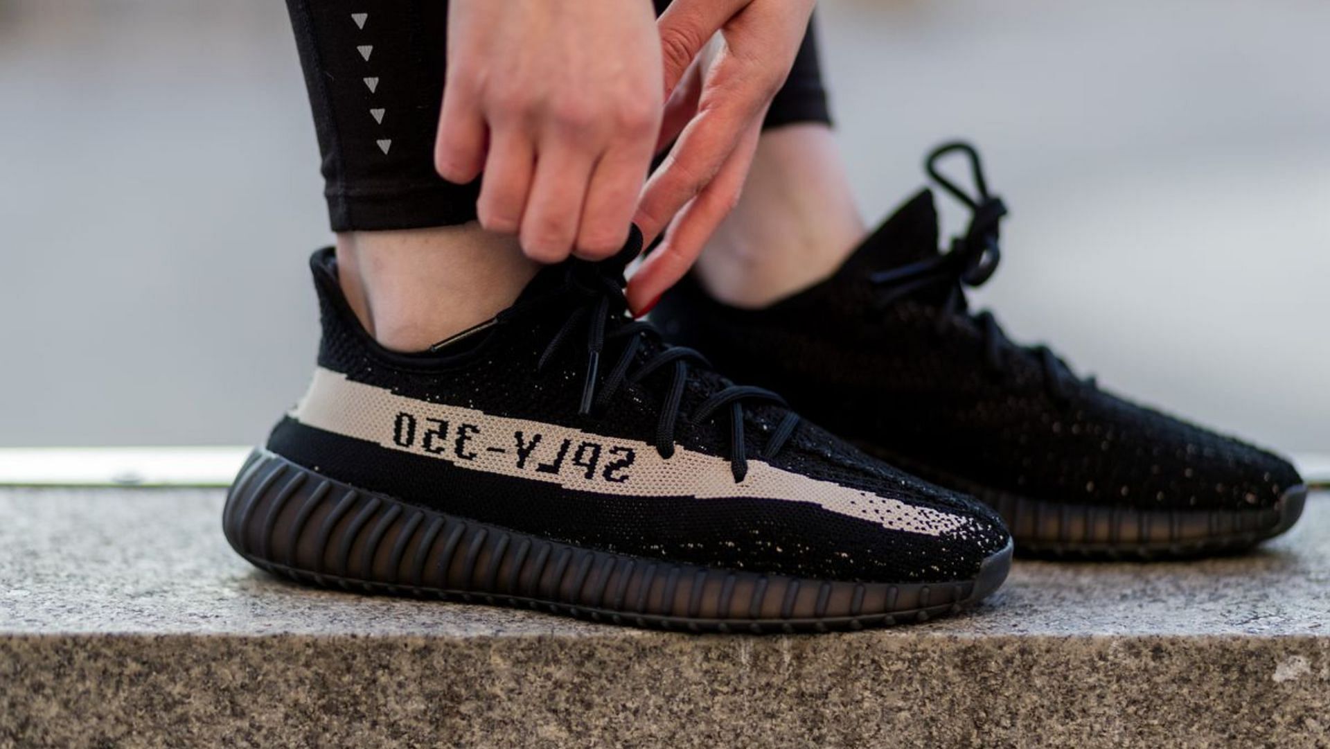 Adidas and Kanye West collaborated for Yeezy in 2015. (Image via Christian Vierig/Getty Images)