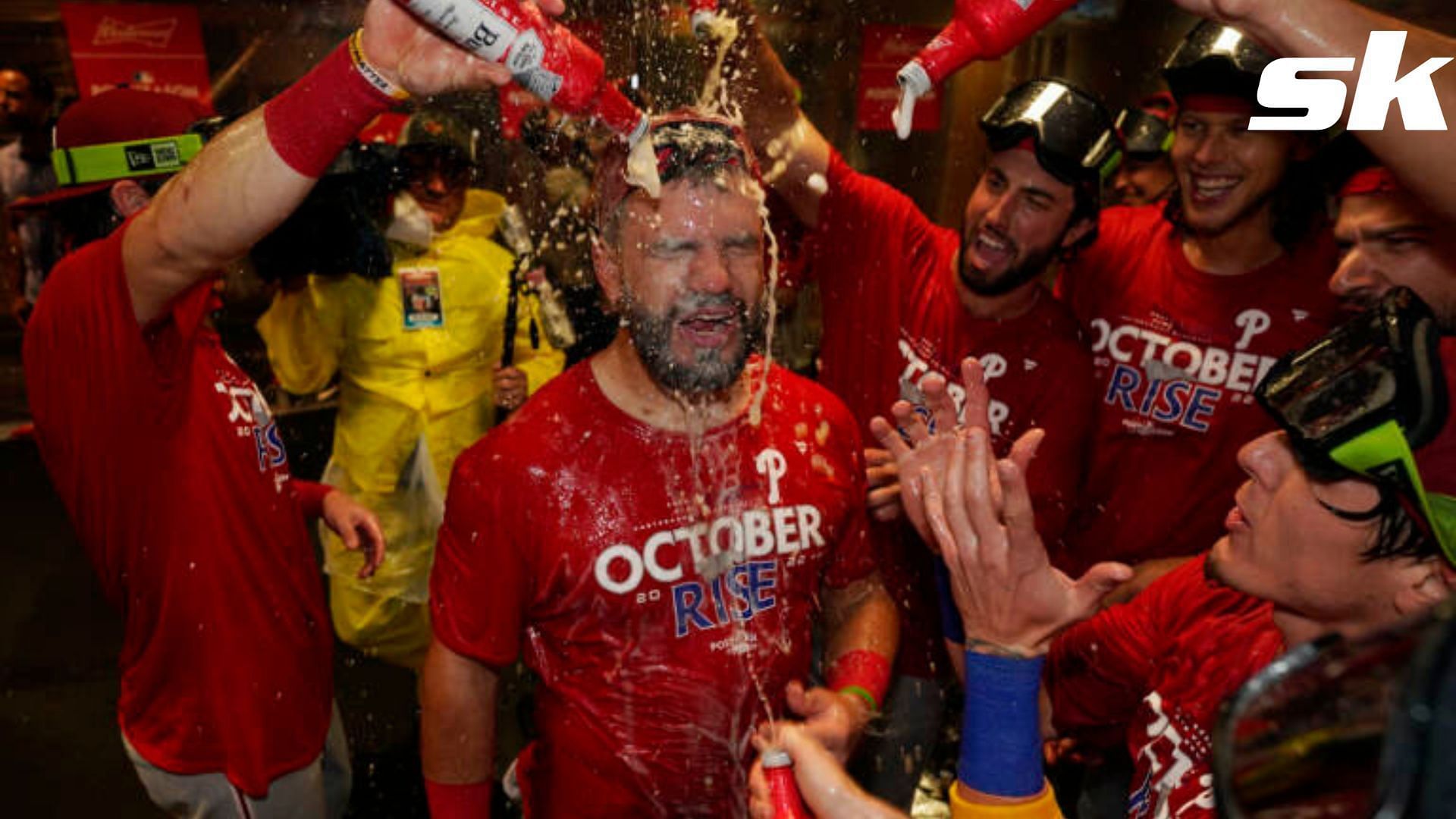 Kyle Schwarber drenches interim manager Rob Thomson with beer