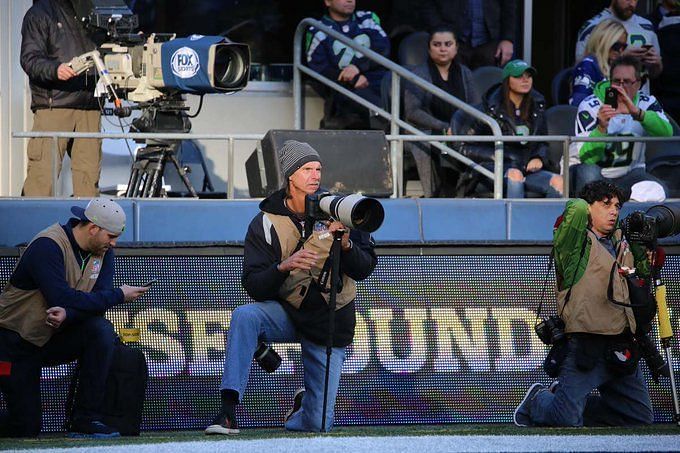 Why is Randy Johnson working the NFL sidelines as a photographer? - AS USA