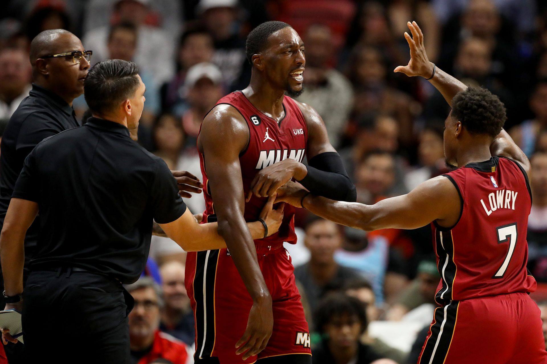 Miami Heat players react to a foul call