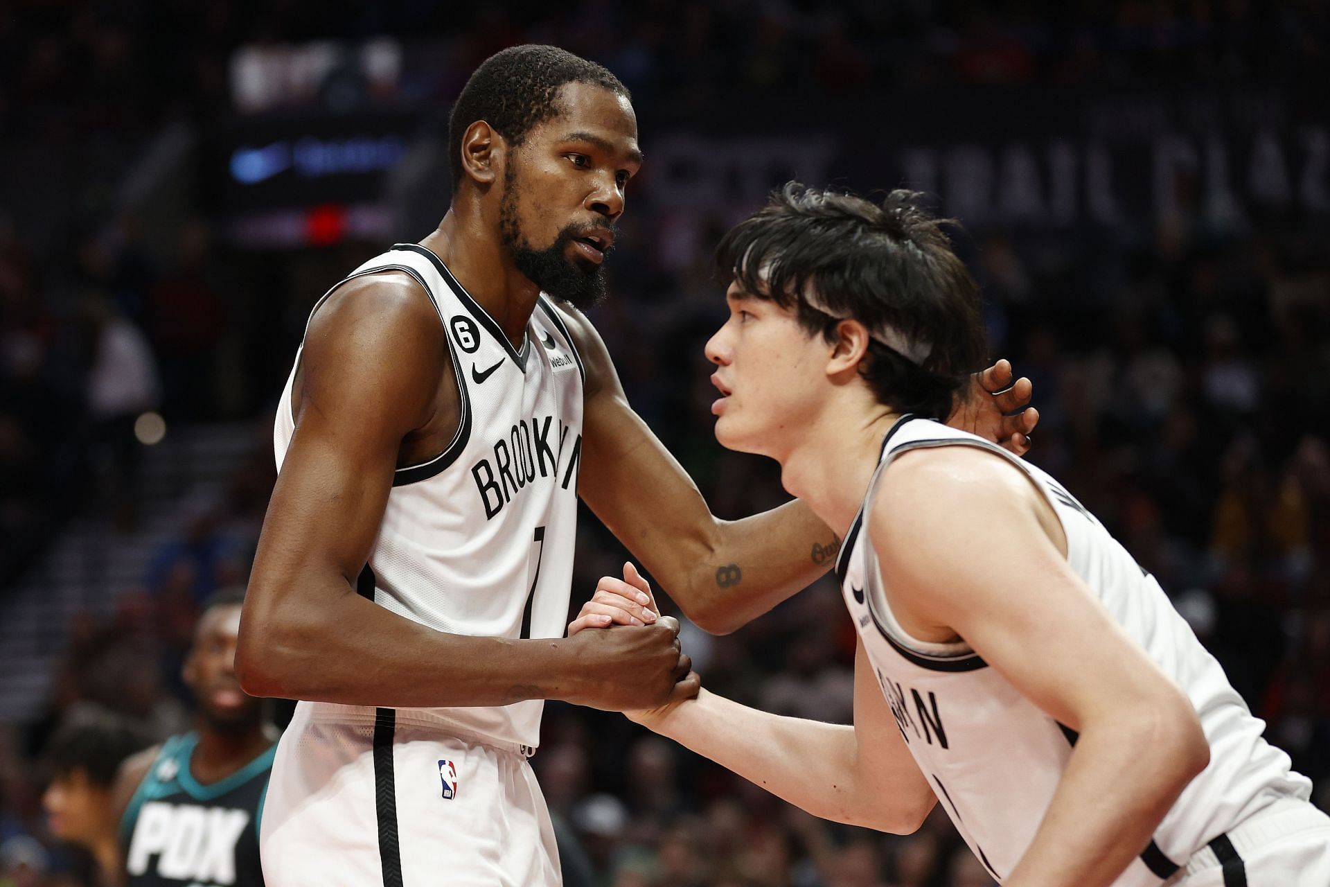 Yuta Watanabe and Kevin Durant of the Brooklyn Nets