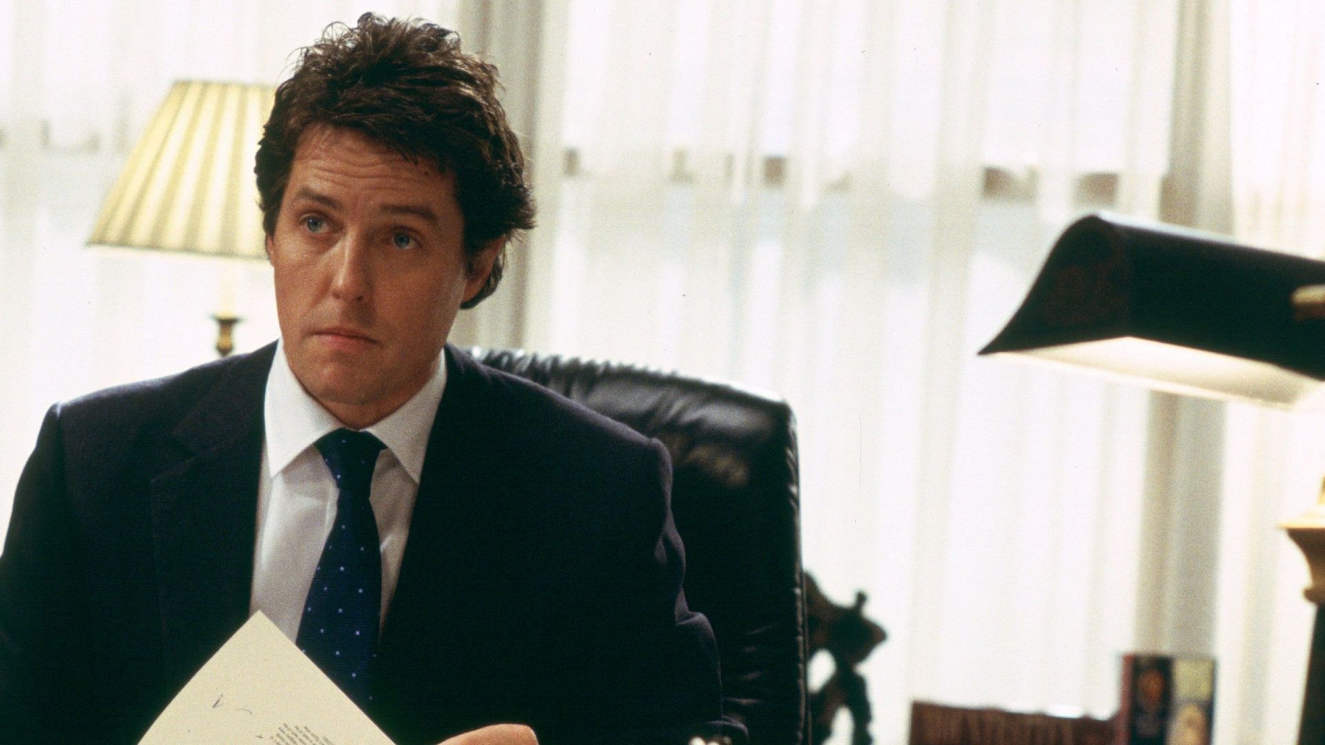 Hugh Grant in Love Actually (Photo via Universal Pictures)