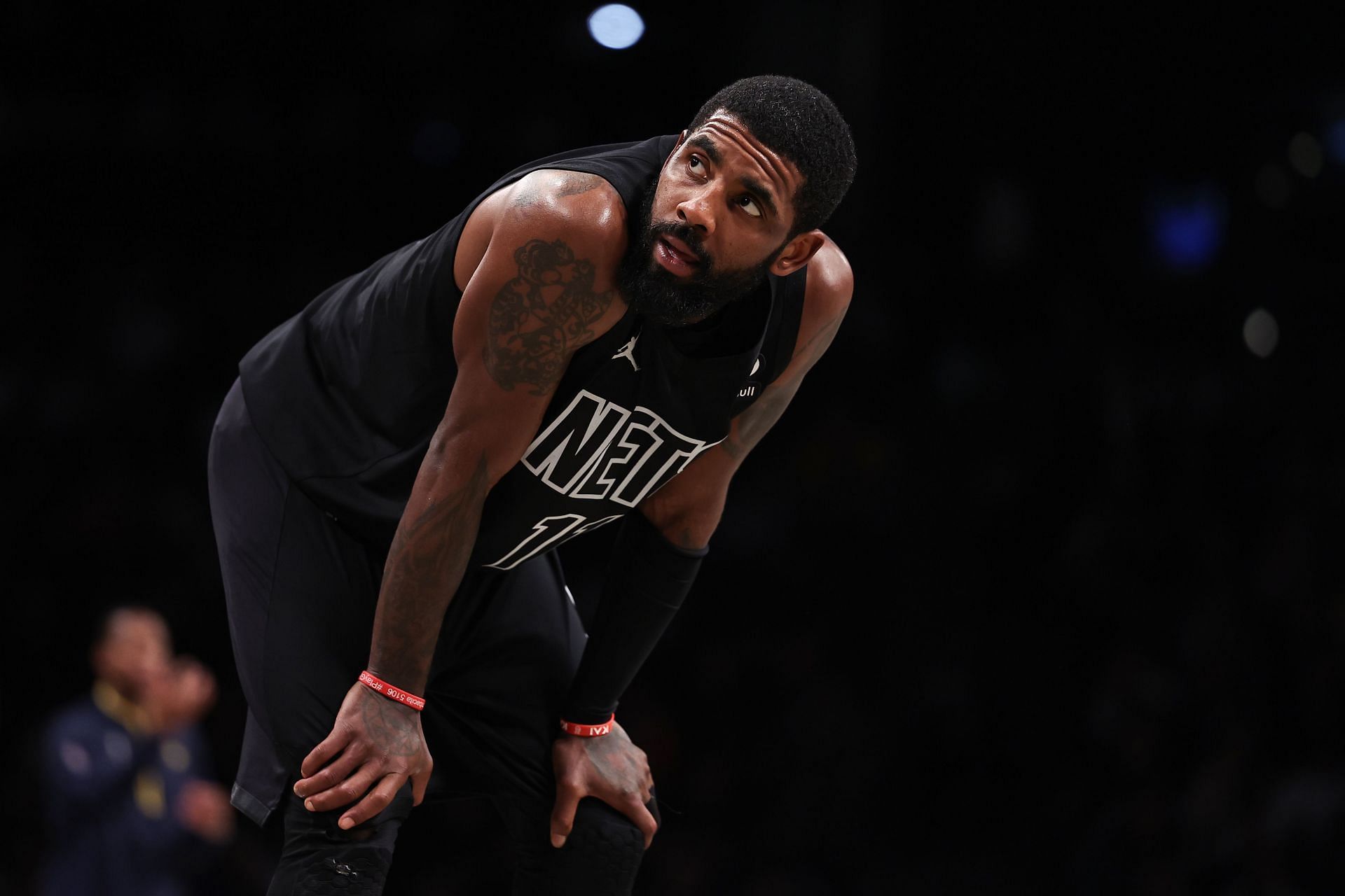 Kyrie Irving talks with NBA's Adam Silver; Jaylen Brown offers support