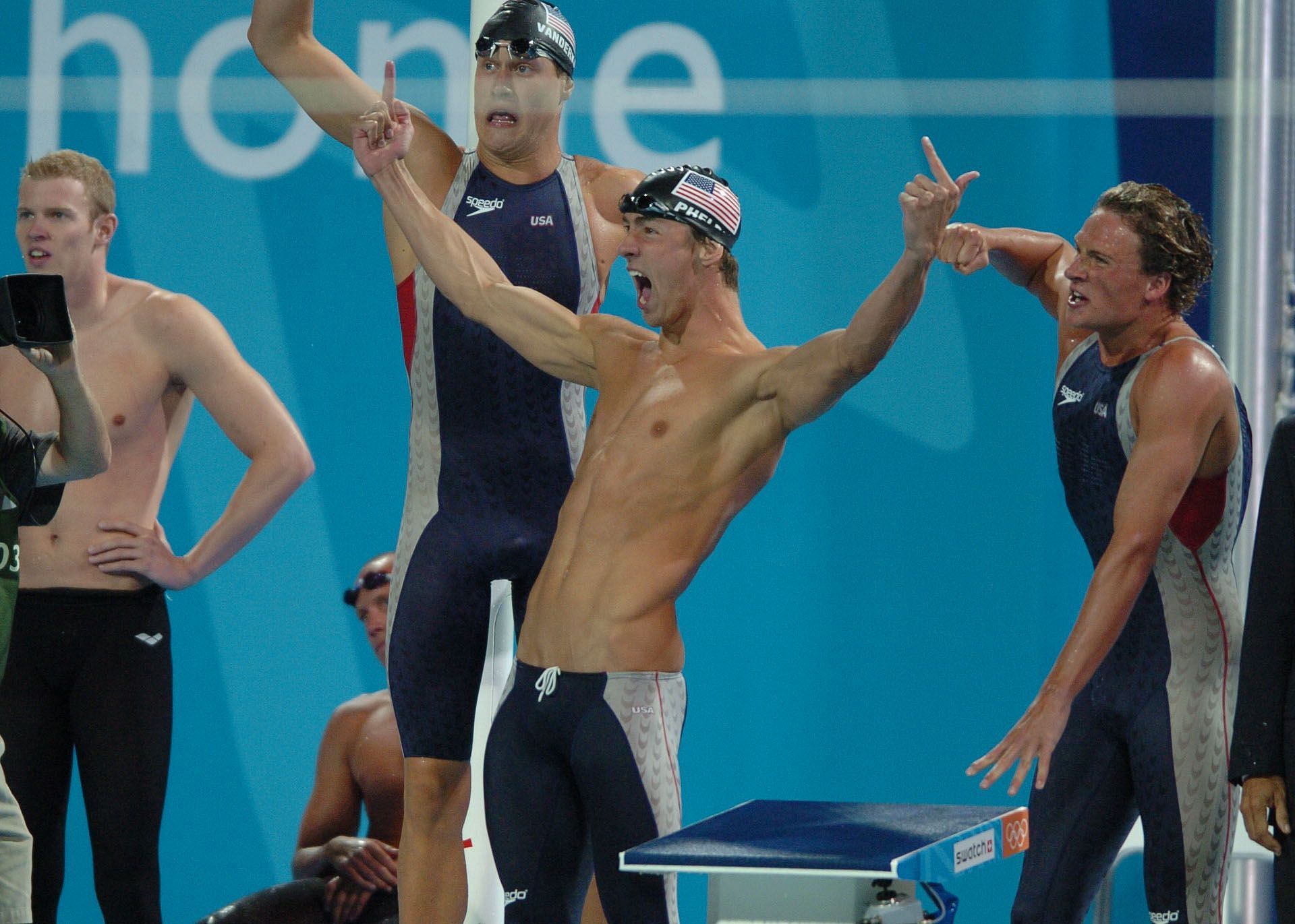 The USA men's 4x200 relay team celebrates their victory (Image via Getty)