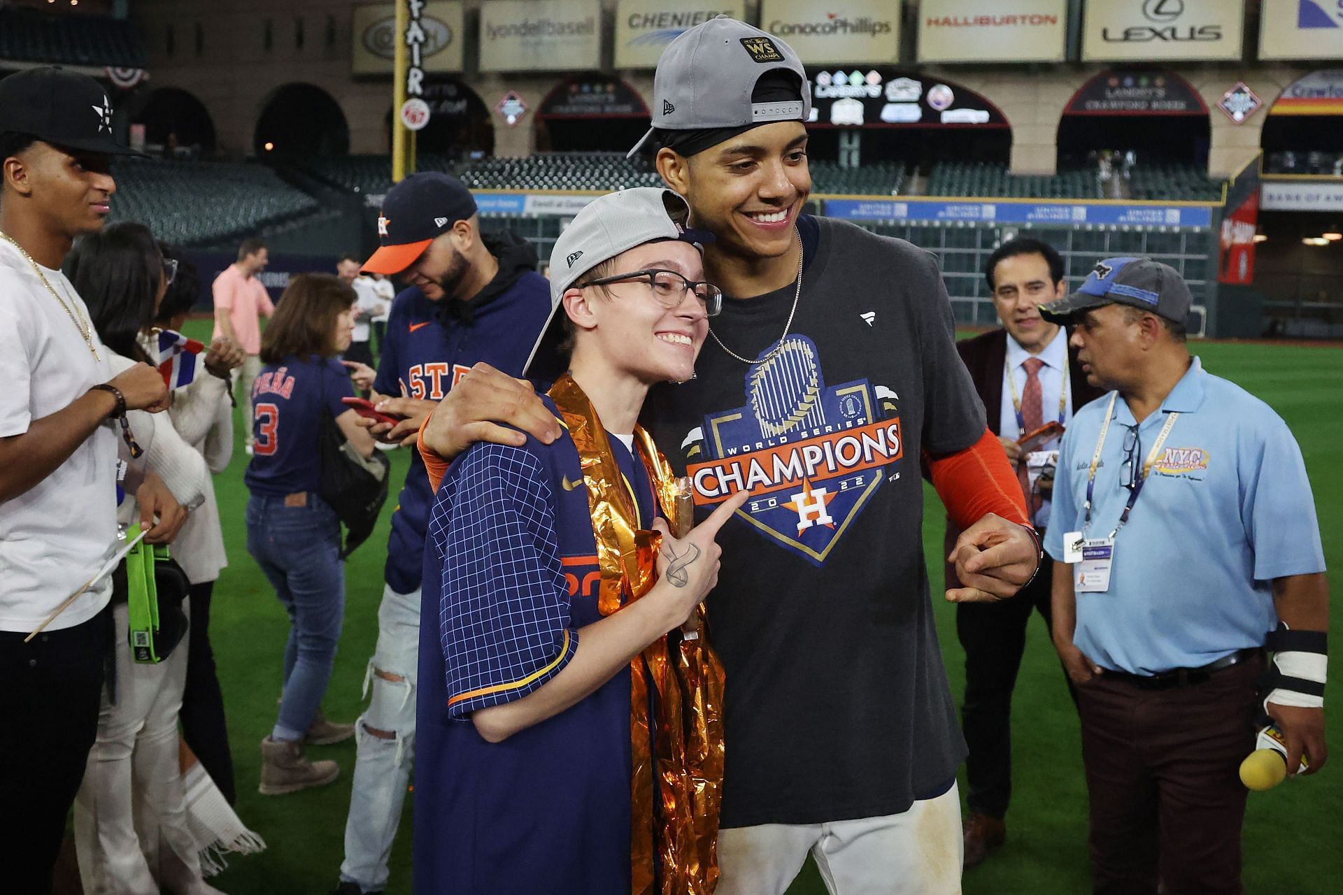 Jeremy Pena poses with a fan after defeating the Philadelphia Phillies 4-1 to win the 2022 World Series