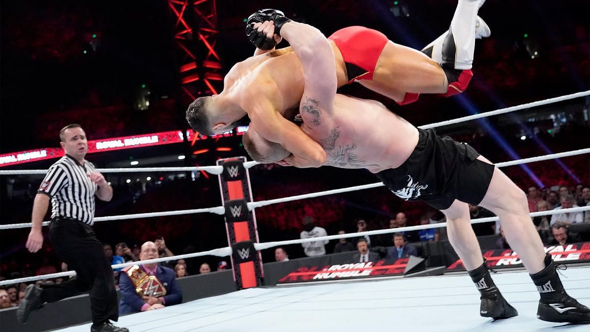 WWE superstars Brock Lesnar and Finn Balor at an event