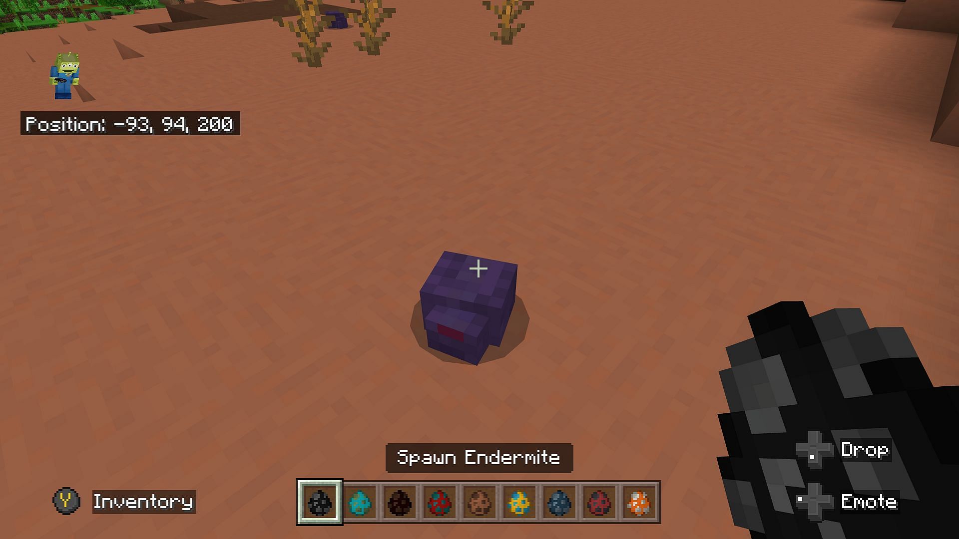 An endermite being spawned through the use of a spawn egg (Image via Mojang)