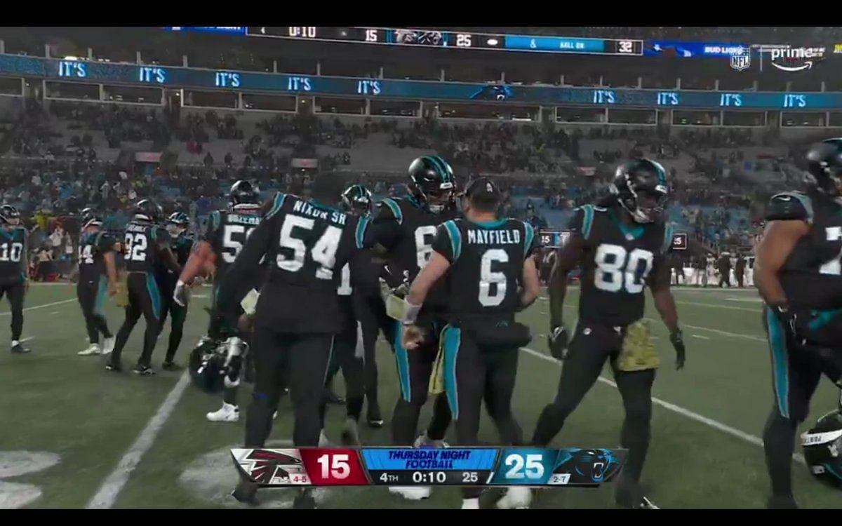 Panthers' Baker Mayfield goes viral for headbutting teammates without  helmet after victory over Falcons