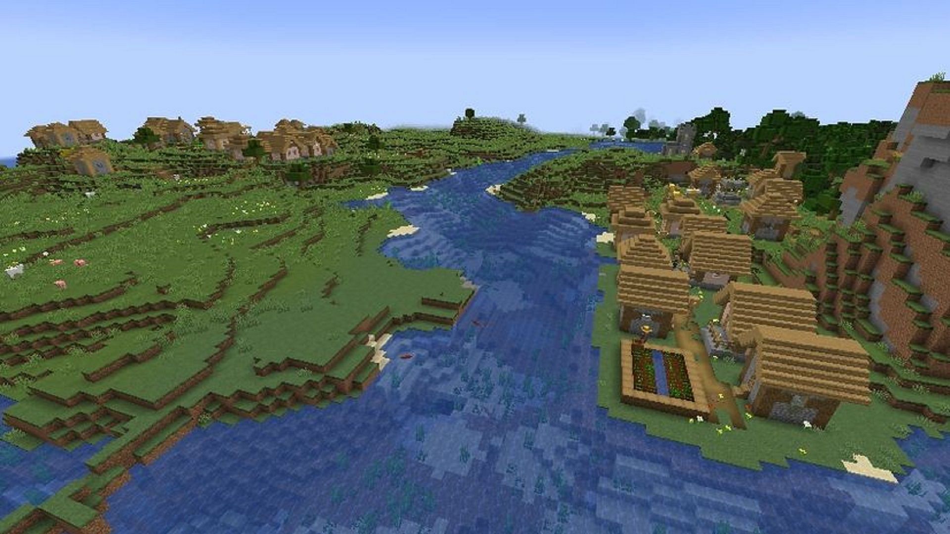 Two villages rest across each other peacefully along a river (Image via Mojang)