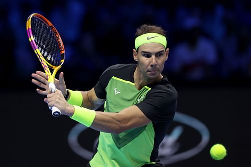 Rafael Nadal returns a shot to Taylor Fritz at the Nitto ATP Final - Day One