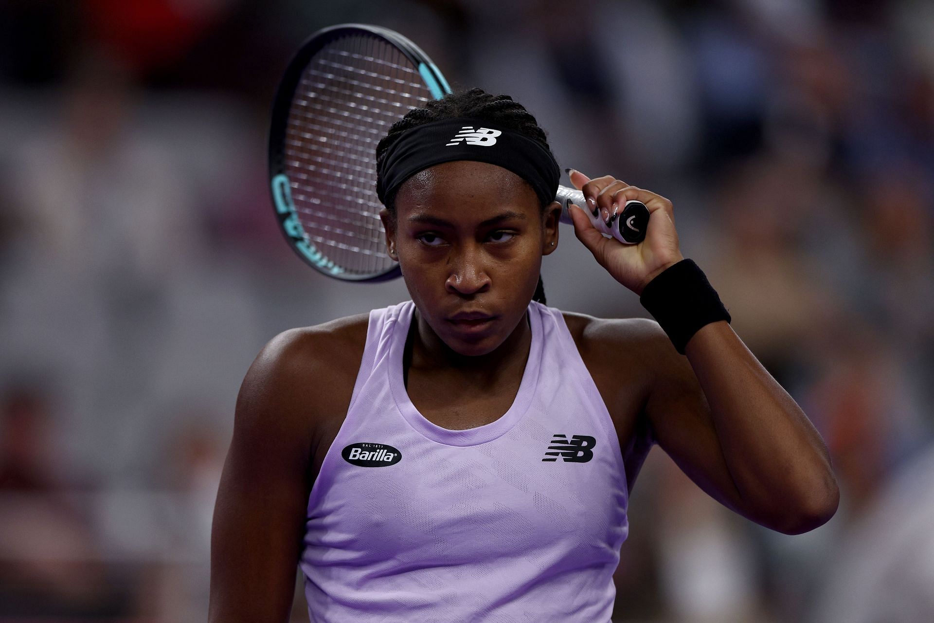 Coco Gauff in action against Iga Swiatek at the 2022 WTA Finals.