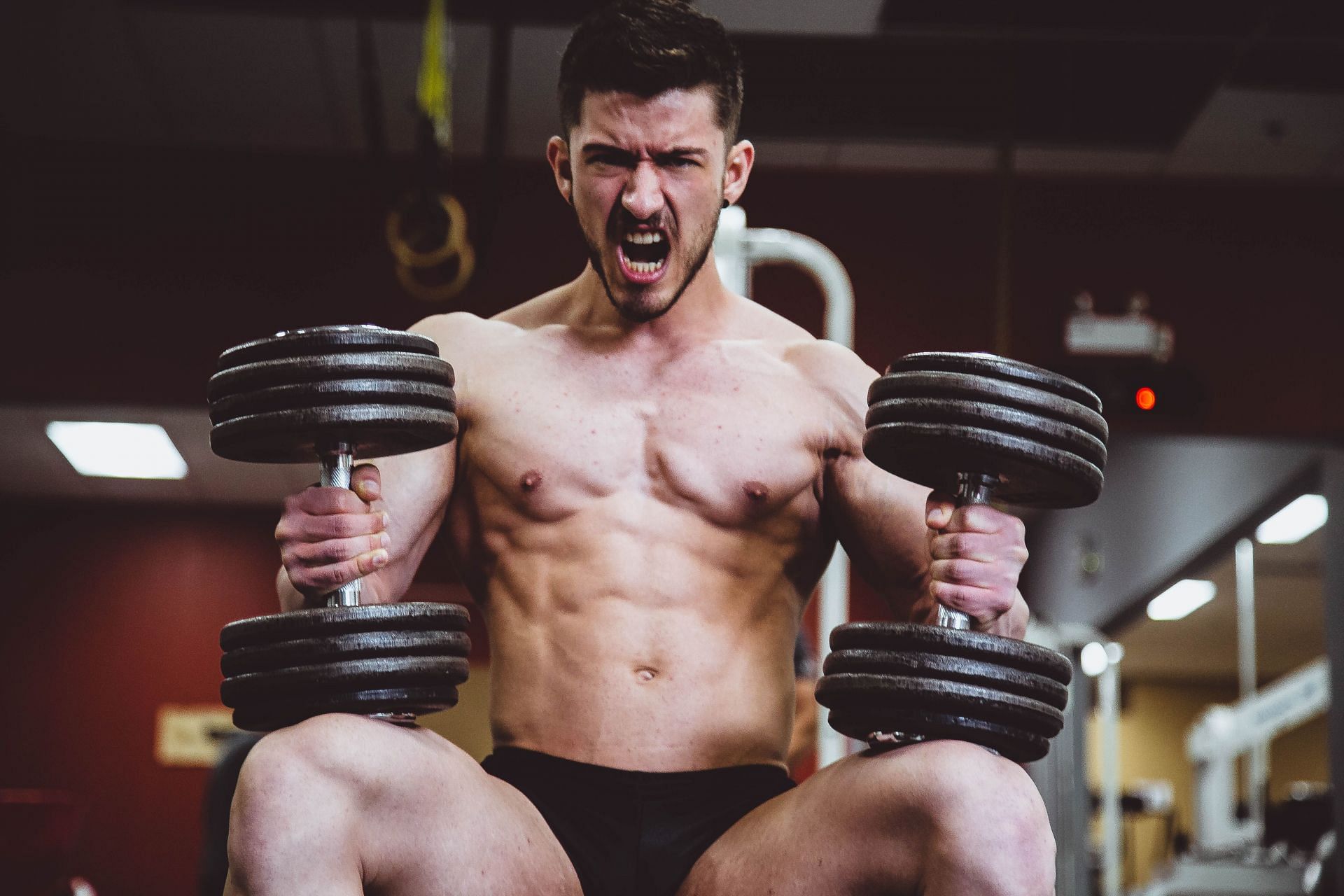Here are the best dumbbell exercises for big muscles! (Image via unsplash/Alora Griffiths)