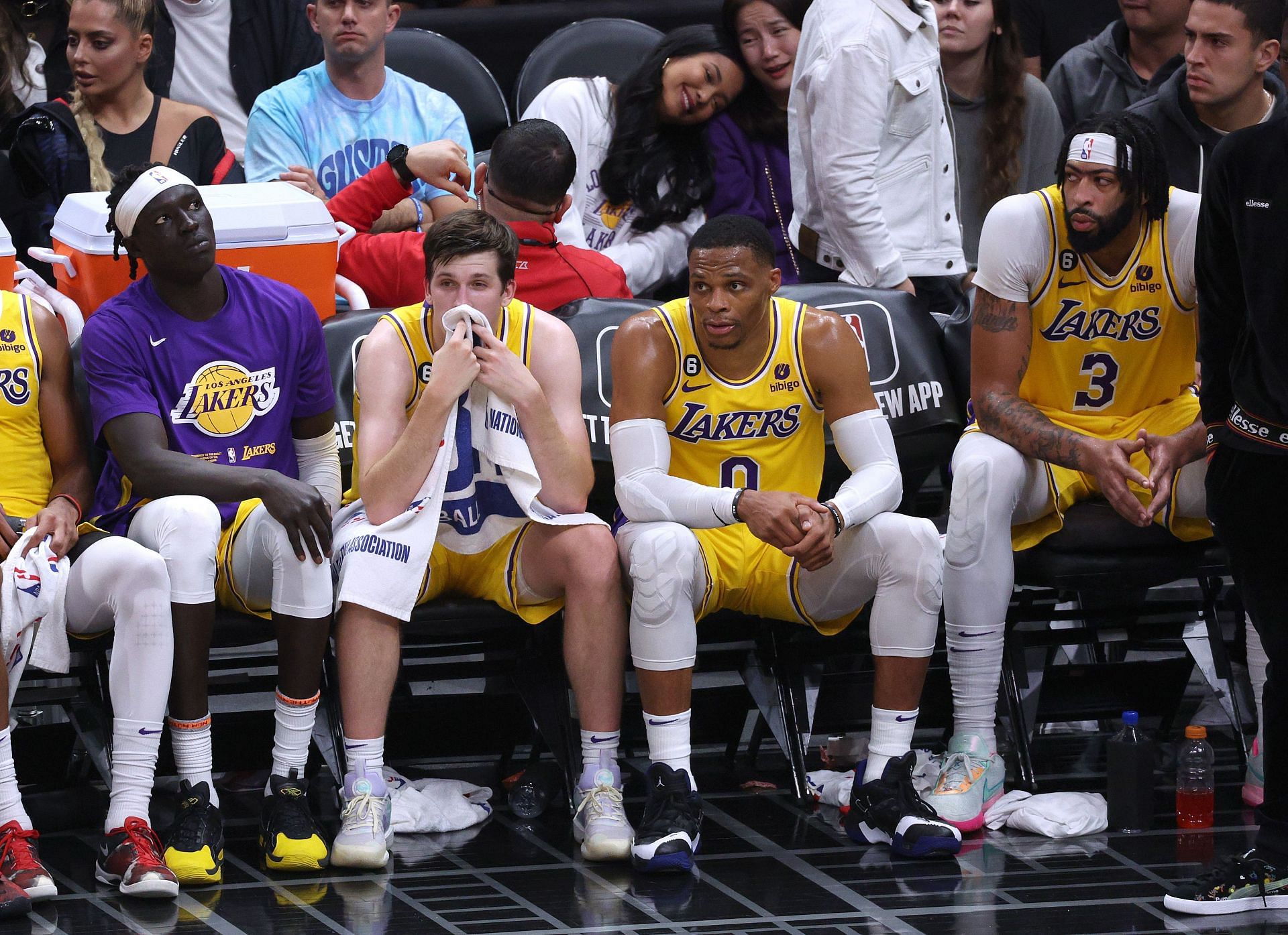 The LA Lakers bench looks on at the game