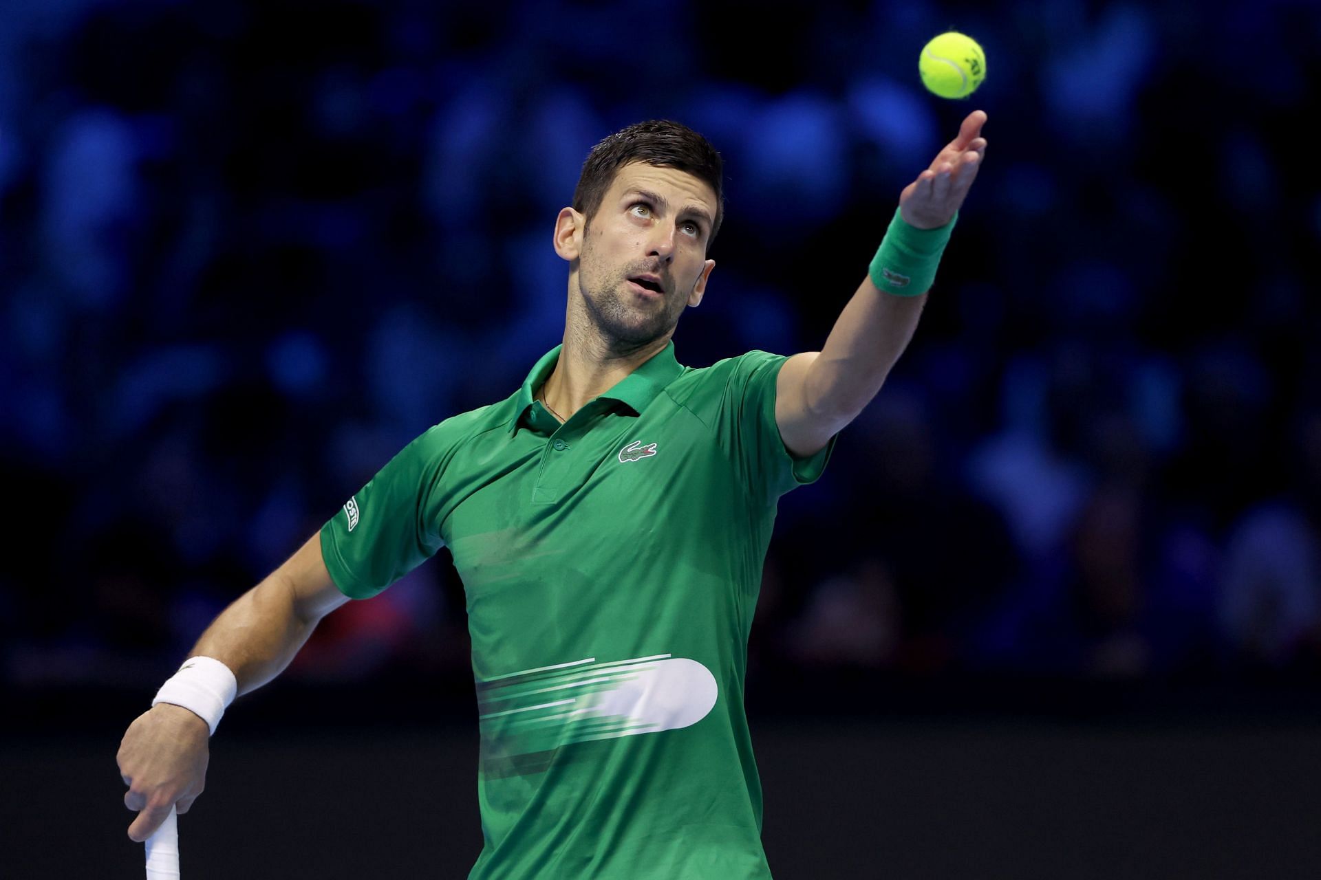 Novak Djokovic in action against Stefanos Tsitsipas at the 2022 ATP Finals.