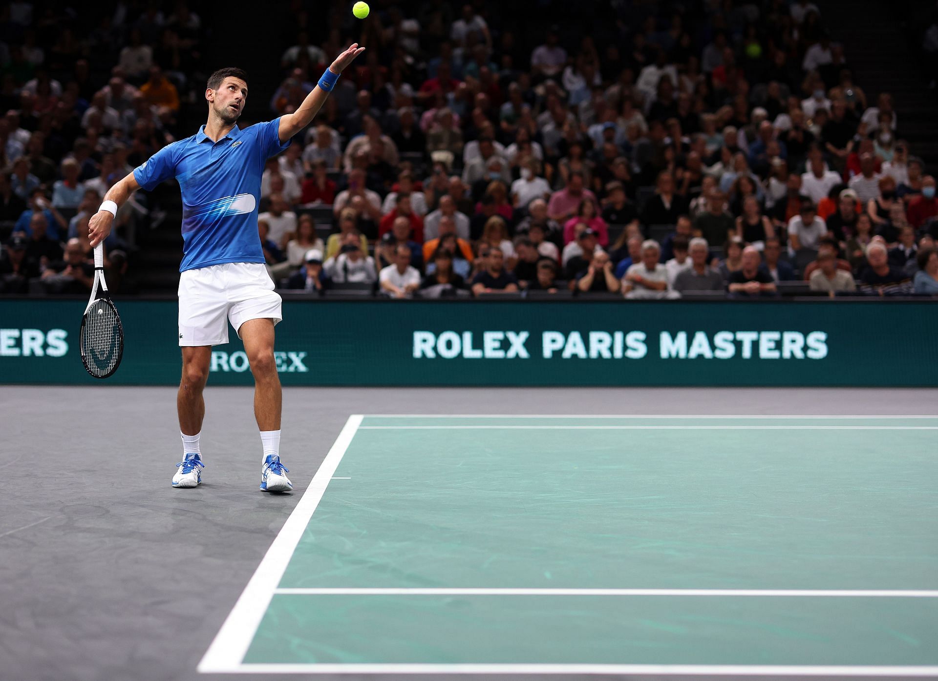 Novak Djokovic of Serbia in action in his round of 16 singles match against Karen Khachanov at the Rolex Paris Masters.