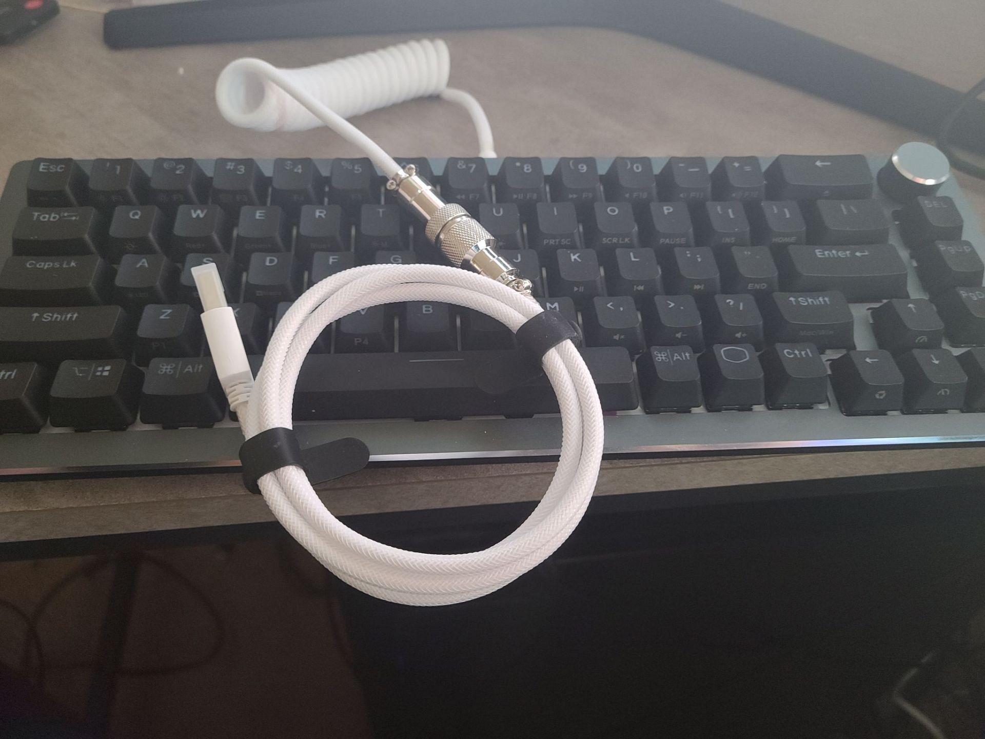 Cooler Master's CK721 with the coiled cable (Image via Cooler Master)