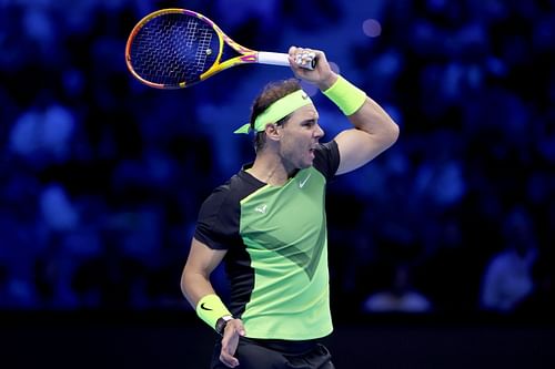 Rafael Nadal returns a shot to Casper Ruud at the 2022 ATP Finals