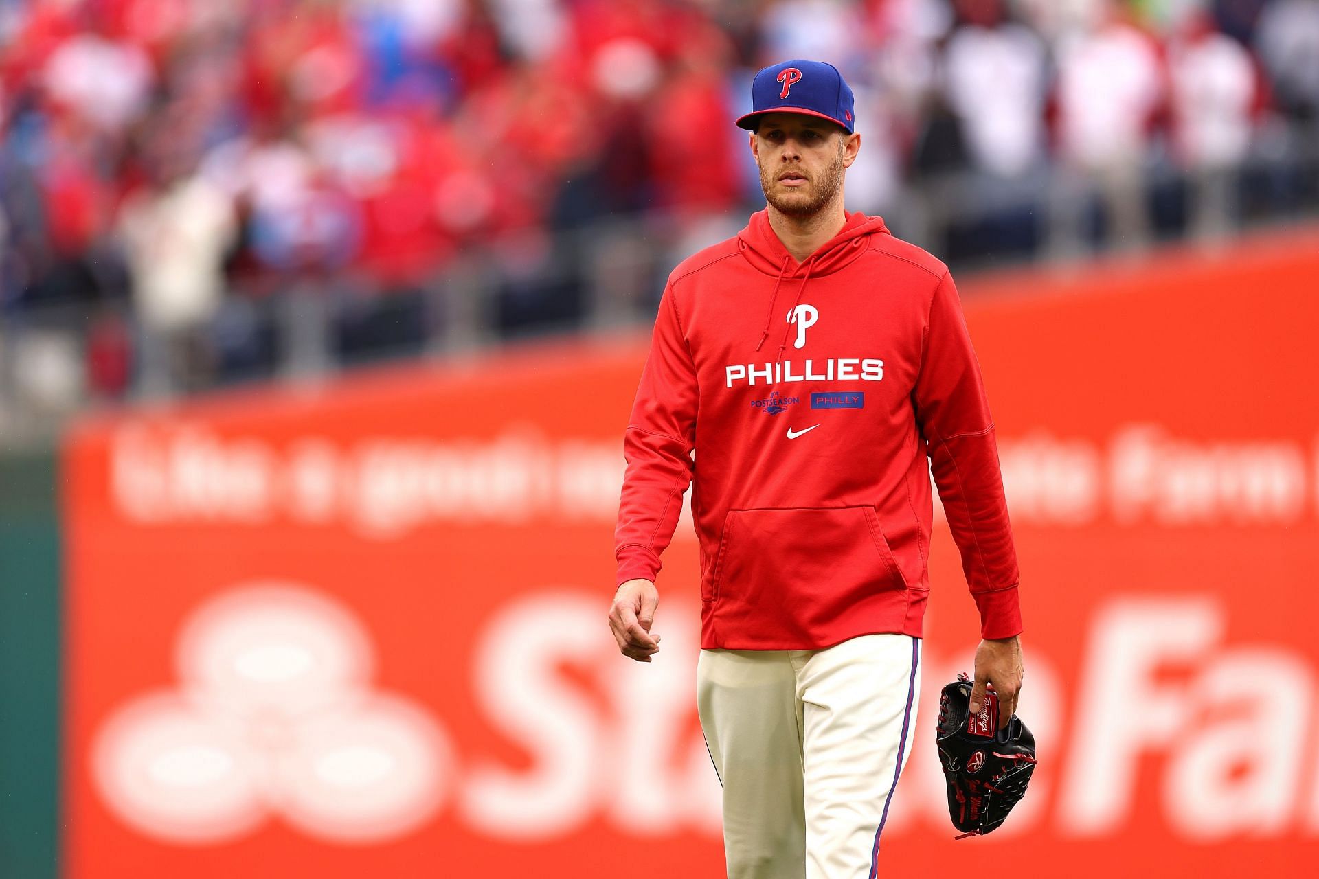 Zack Wheeler walks to the dugout prior to game five of the NLCS at Citizens Bank Park