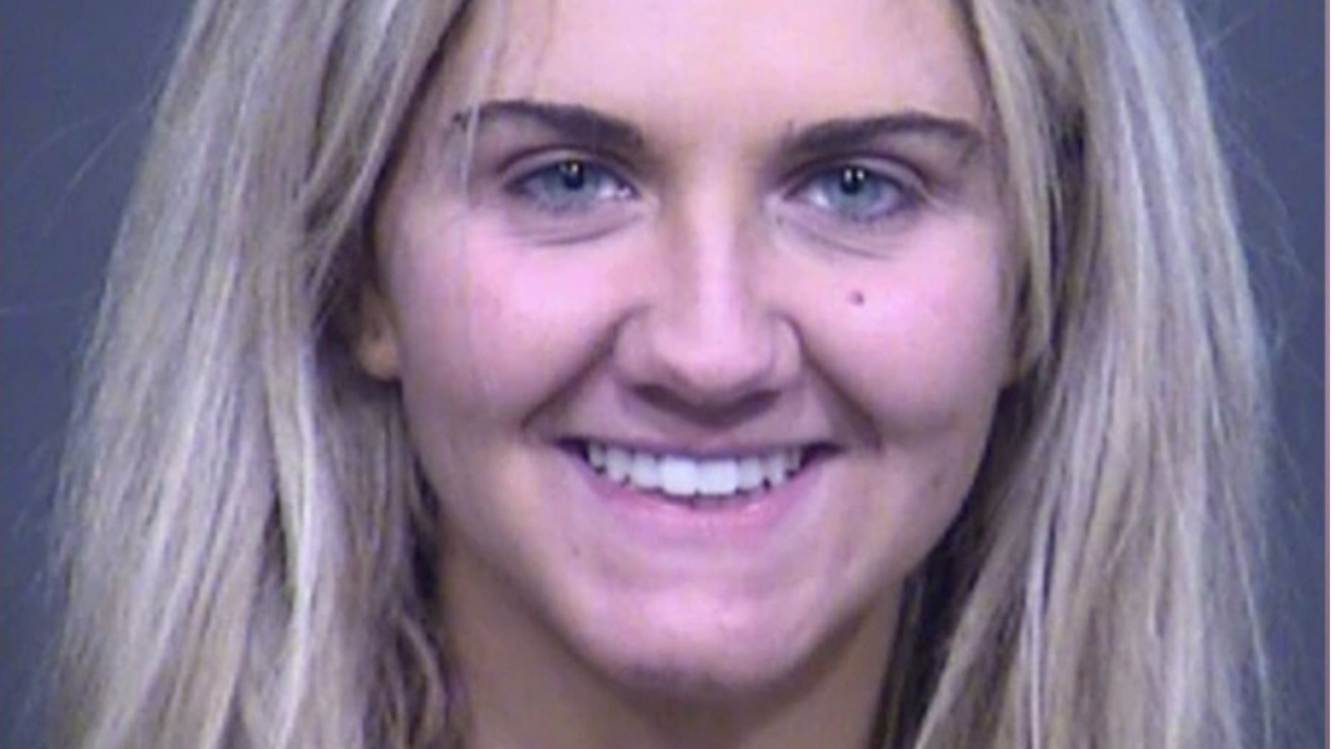 Clare Margaret Meacham was seen smiling widely in her mugshot following her arrest for DUI and child abuse (Image via Maricopa County Sheriff