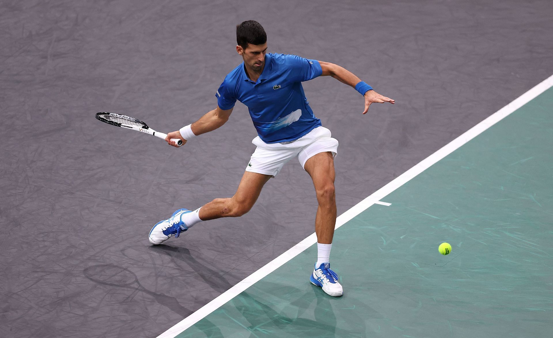 Novak Djokovic in action against Maxime Cressy at the Rolex Paris Masters - Day Two