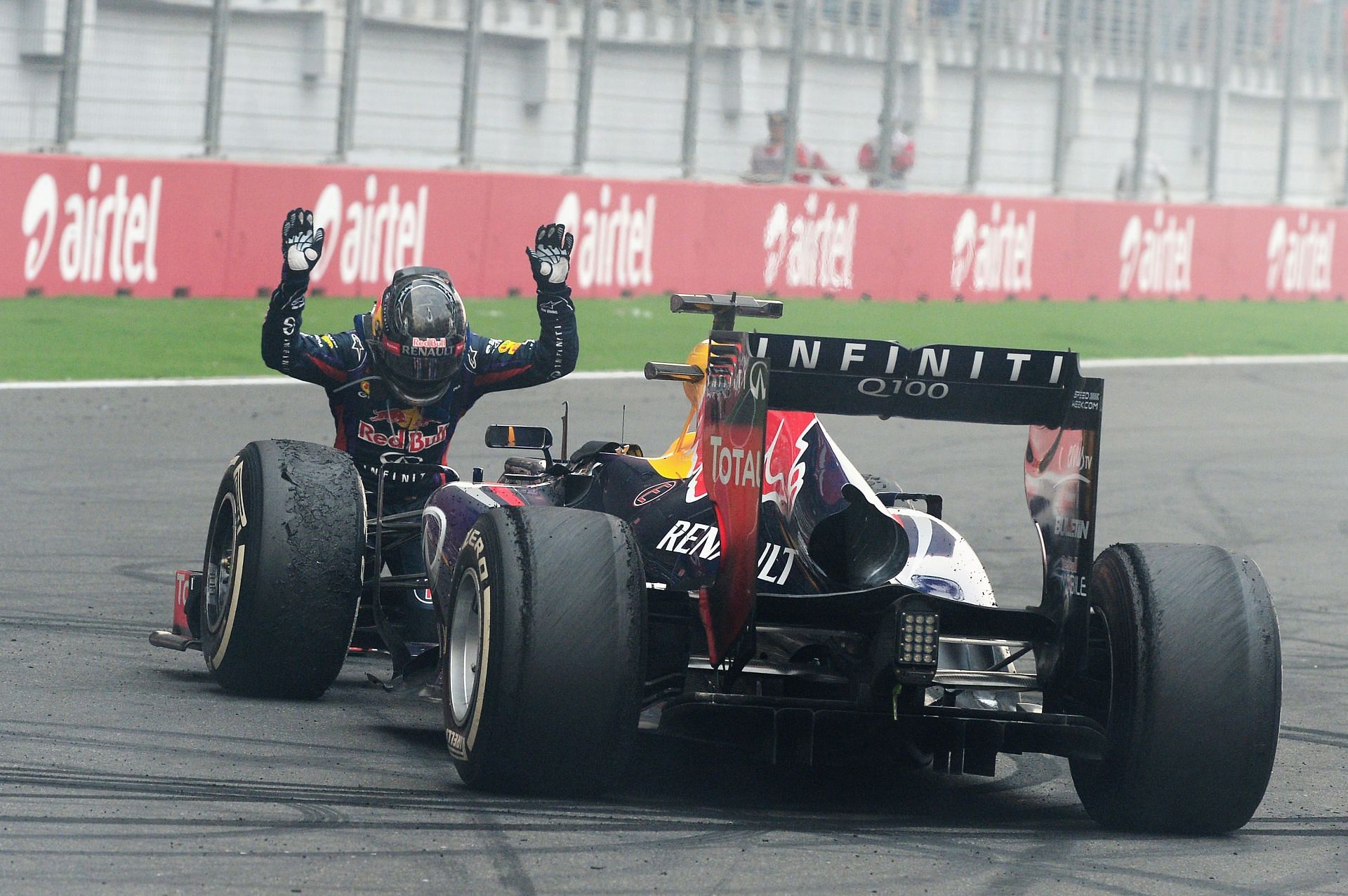 Vettel bowing down to the car after sealing his fourth world championship at the Indian Grand Prix in 2013 Sebastian Vettel celebrates on the podium after winning the Monaco Grand Prix of 2017