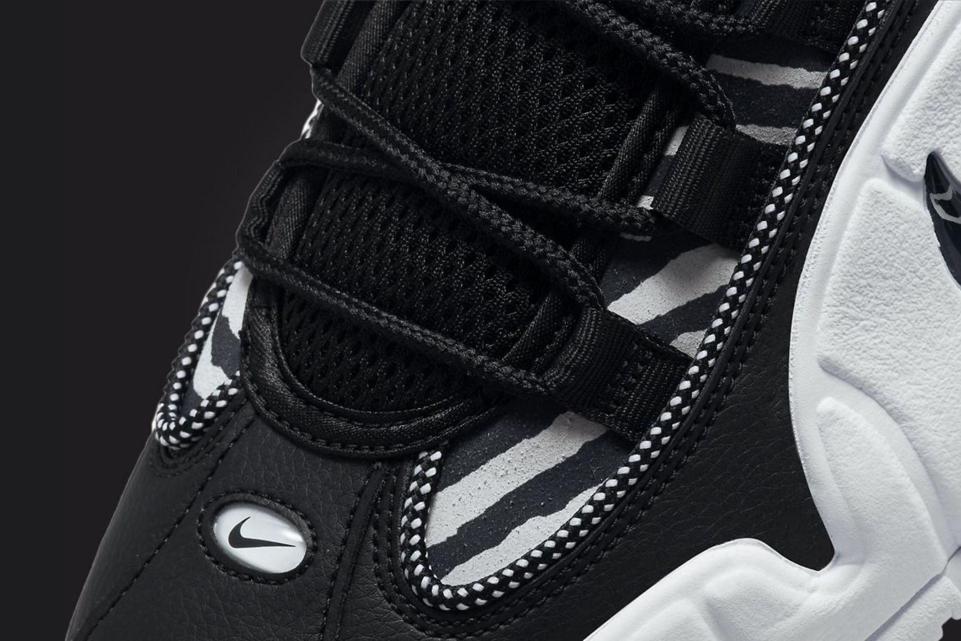 Here&#039;s a detailed look at the meshed tongue flaps of the Air Max Penny 1 &quot;Tiger Stripes&quot; sneakers (Image via Nike)