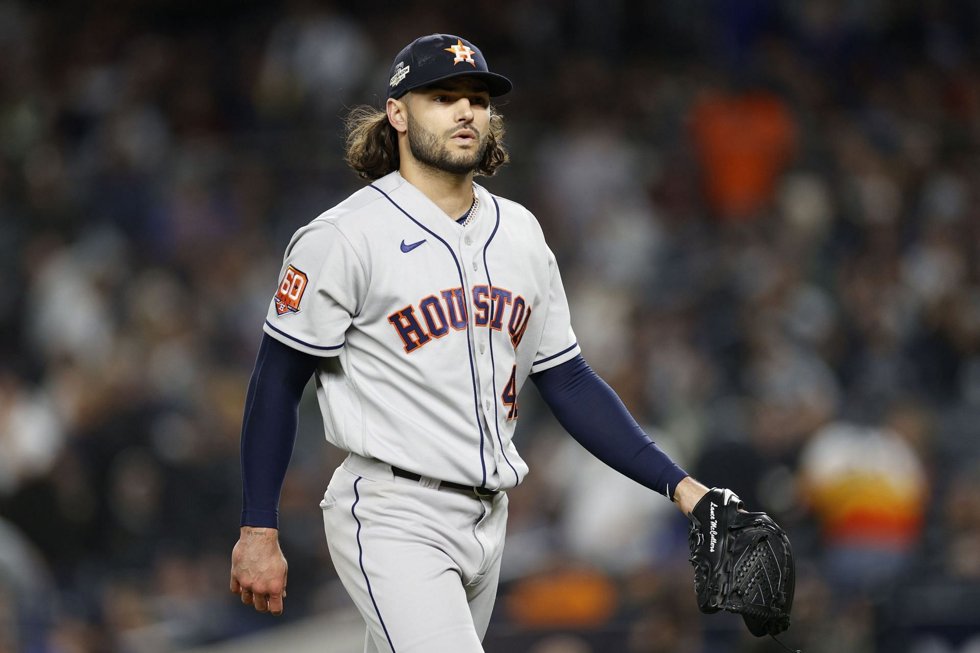 Houston Astros starting pitcher Lance McCullers Jr., right, leaps