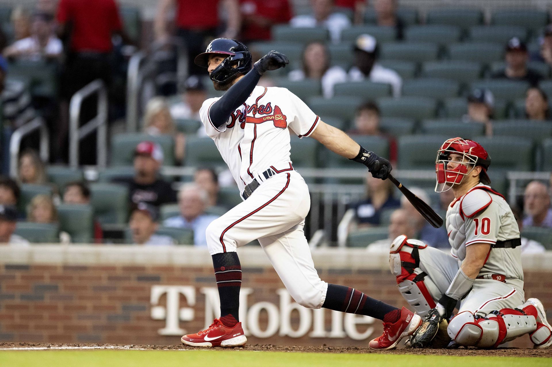 Dansby Swanson hits an RBI against the Philadelphia Phillies during the second inning at Truist Park.