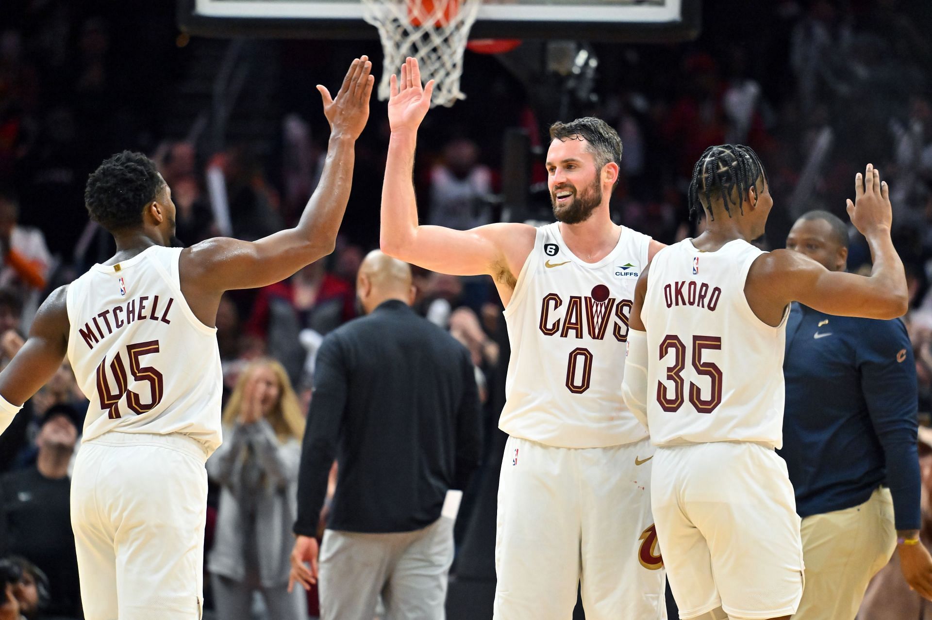 Donovan Mitchell, Kevin Love and Isaac Okoro of the Cleveland Cavaliers.