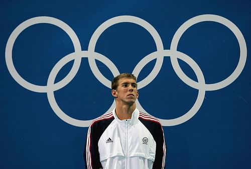 Michael Phelps during the Men's 100m Butterfly Medal Ceremony at the 2004 Summer Olympics