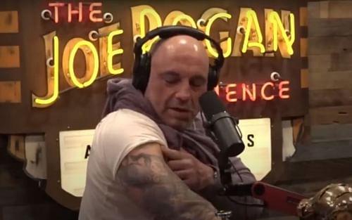 Joe Rogan showing the tattoo of Miyamoto Musashi on his right arm.