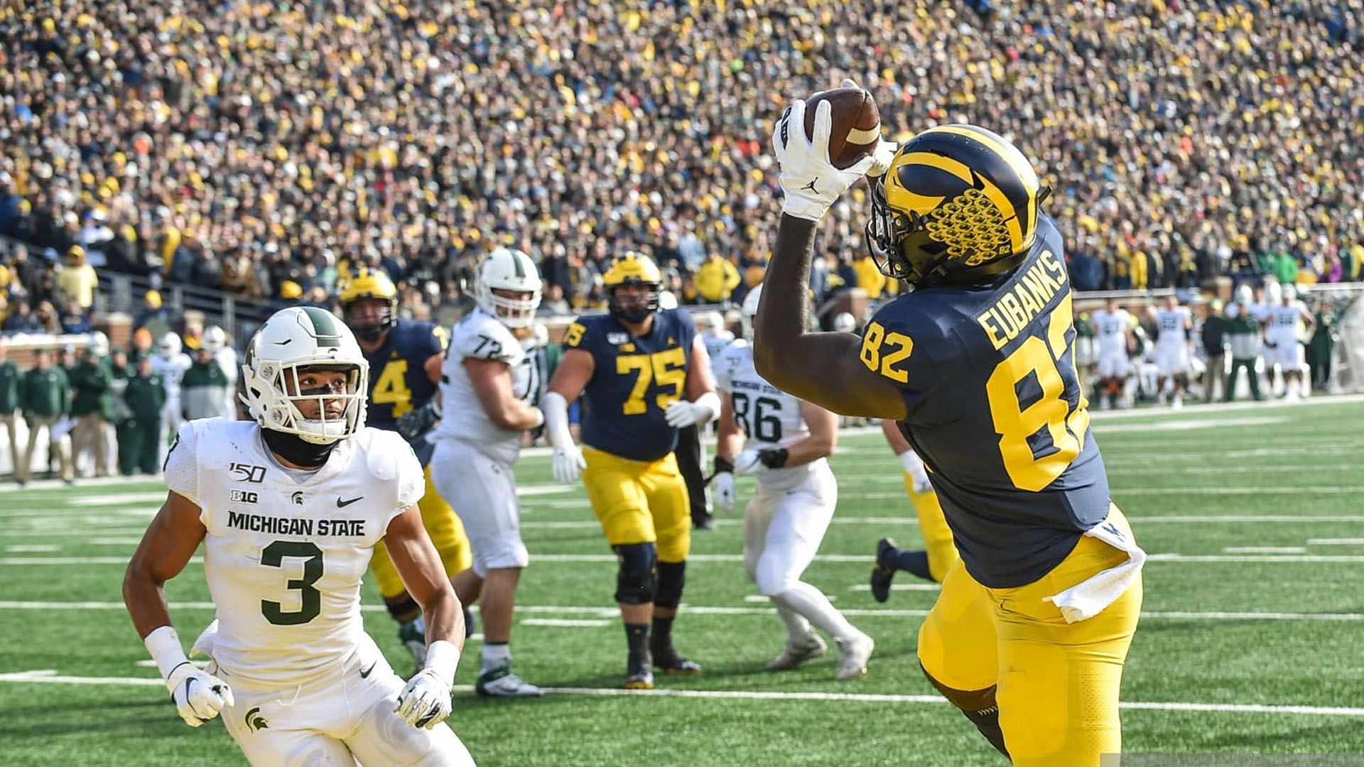 Michigan State players and Michigan University get in an ugly brawl in the tunnel (image via Getty Images) 