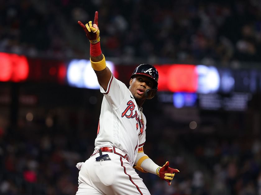 Watch: Fans run on field, collide with Braves star Ronald Acuna Jr