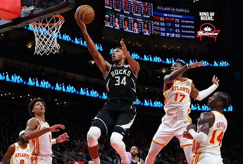 Giannis Antetokounmpo finishing a finger roll against the Atlanta Hawks